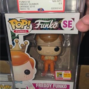 Funko SE Freddy Funko in Orange Suit